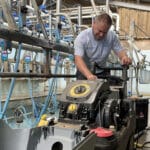 pressure washer service enginner repairing a broken karcher pressure washer
